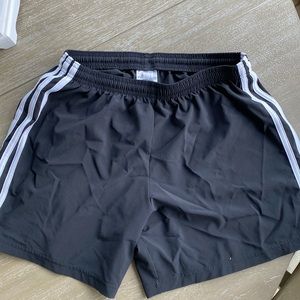 Adidas soccer shorts.   Size small. White trim.   Excellent condition.